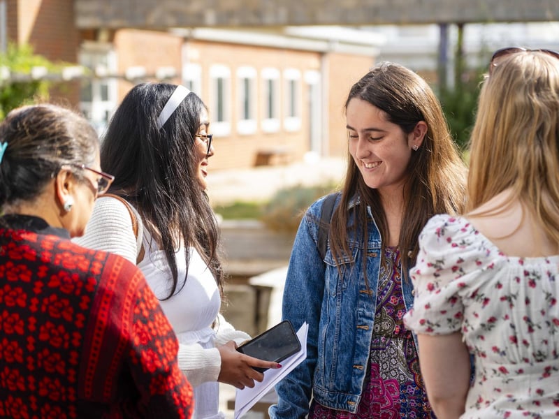 Students share the news of their results at City of Portsmouth College results day 2024.