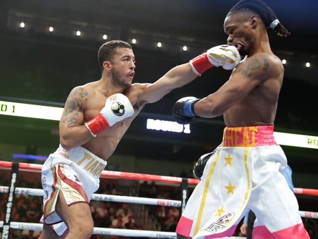 Mikey McKinson lands a shot on Alex Martin in their Galen Centre contest Picture: Tom Hogan/Golden Boy Promotions