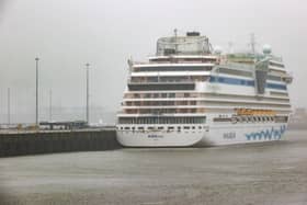 The Italian registered cruise ship 'Aidamar' was due to call at Portsmouth International Port, but her visit has been postponed due to the poor weather. A yellow weather warning for rain is currently in place over the city and much of the south coast of England. Picture: KURT DESPLENTER/BELGA/AFP via Getty Images.