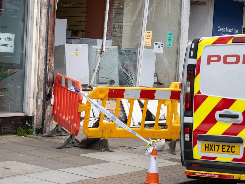 A police car has allegedly crashed into the front of a shop on Albert Road.Pictured - The resulting damage and police on scenePhotos by Alex Shute