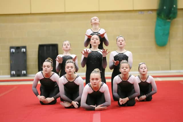 Portsmouth School of Gymnastics' Jets team. Back: Aimee Puttock. Middle (from left): Libby Herbert, Chloe Thompson, Amie Cooper. Front: Sadie Inman, Grace Barrett, Kayleigh Steere, Elsie Wood, Hannah Pennells. The team are coached by Amy and Ethan Brown