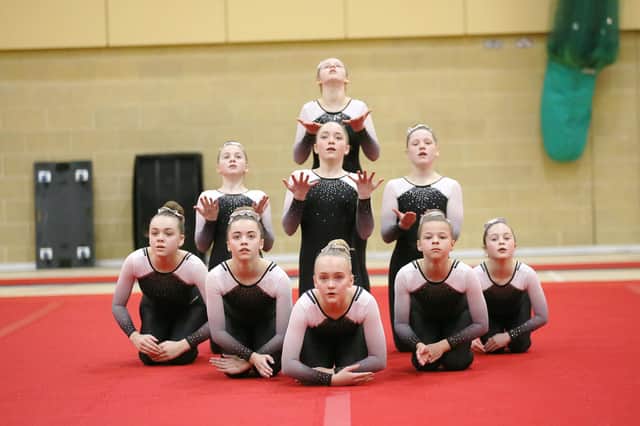 Portsmouth School of Gymnastics' Jets team. Back: Aimee Puttock. Middle (from left): Libby Herbert, Chloe Thompson, Amie Cooper. Front: Sadie Inman, Grace Barrett, Kayleigh Steere, Elsie Wood, Hannah Pennells. The team are coached by Amy and Ethan Brown