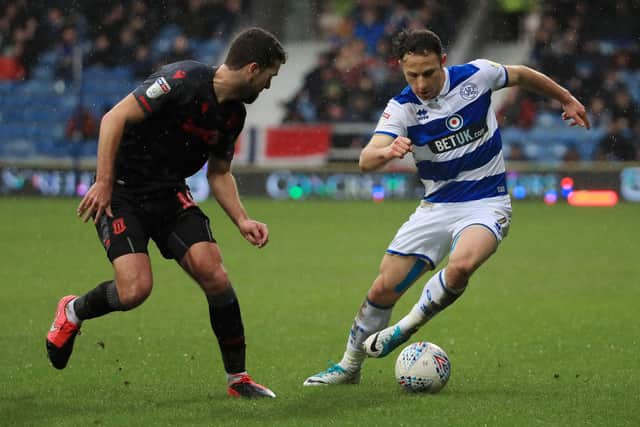 Marc Pugh, right, in QPR colours last season. (Photo by Andrew Redington/Getty Images)