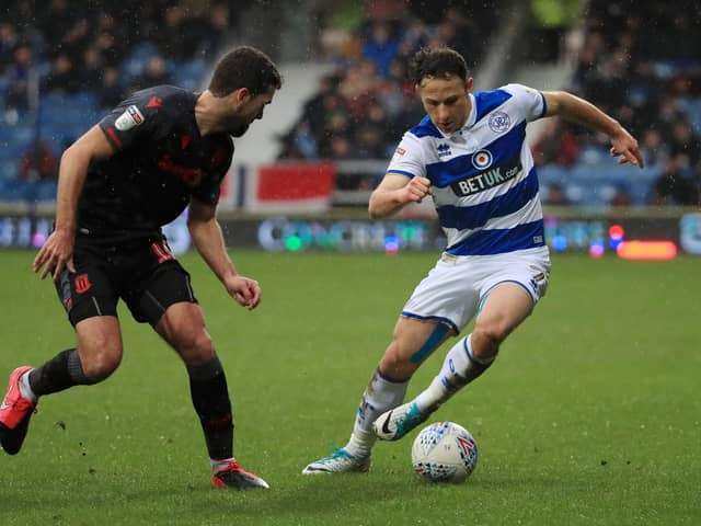 Marc Pugh, right, in QPR colours last season. (Photo by Andrew Redington/Getty Images)
