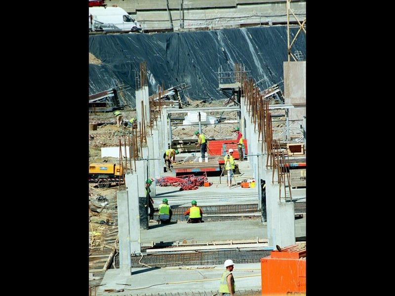 Construction workers work on the lower underground car parking level at Gunwharf Quays in 1999. Picture: The News 992549-2