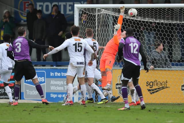Hawks keeper Ross Worner can't stop Sam Merson heading St Albans level. Photo by Dave Haines