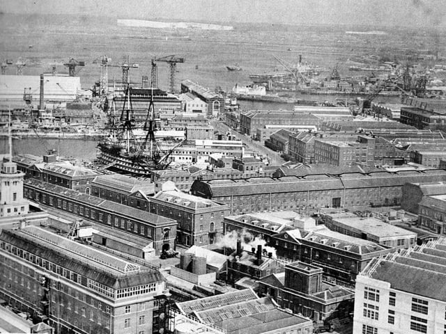 An aerial view over Portsmouth Dockyard. A  magnificent view over the dockyard to the chalk pits of Portsdown Hill.  The great Rope House can be seen lined out.