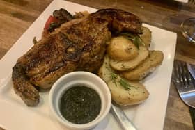 Grilled lamb cutlets served with garlic and rosemary potatoes and seasonal vegetables.