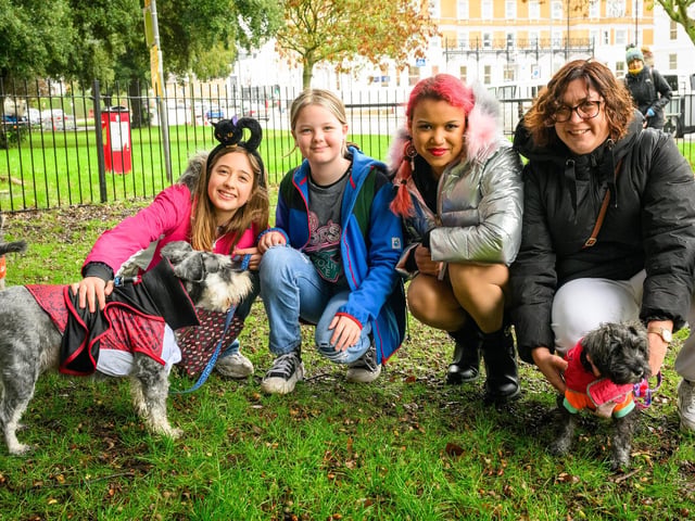 Pictured is: A family with their two SchnauzersPicture: Keith Woodland (291021-15)