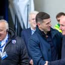 John Mousinho and former Pompey boss Paul Cook during Sunday's FA Cup clash at Chesterfield. Picture: Simon Davies/ProSportsImages