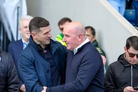 John Mousinho and former Pompey boss Paul Cook during Sunday's FA Cup clash at Chesterfield. Picture: Simon Davies/ProSportsImages