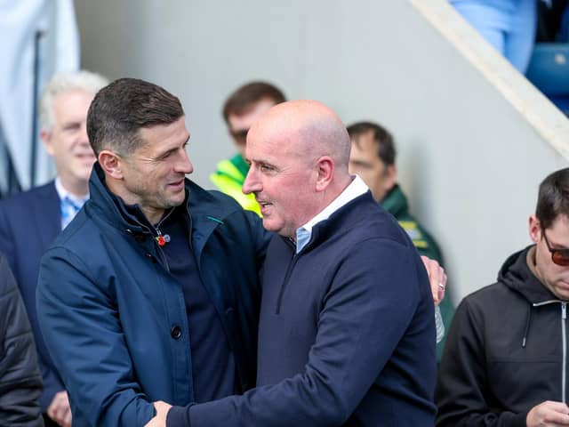 John Mousinho and former Pompey boss Paul Cook during Sunday's FA Cup clash at Chesterfield. Picture: Simon Davies/ProSportsImages