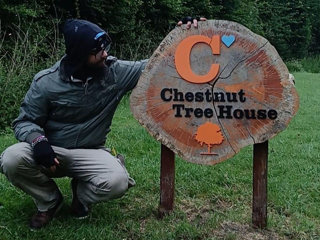 Kyle on the property of The Chestnut Tree House children's hospice