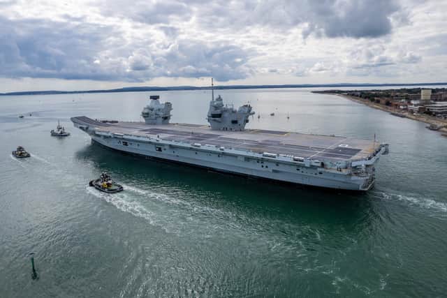 HMS Prince of Wales will be returning to Portsmouth despite a weather warning being issued. Pictured is her leaving Portsmouth Harbour on September 4.