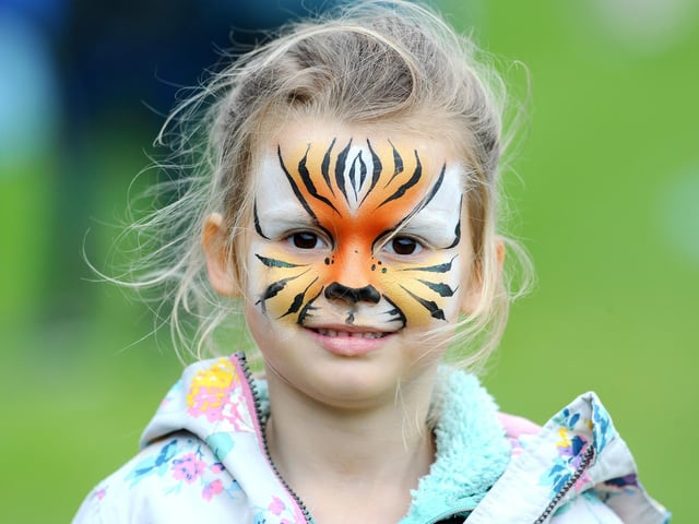 Four-year-old Luna Garrard from Selsey enjoyed having her face painted. Picture: Sarah Standing (080523-4675)