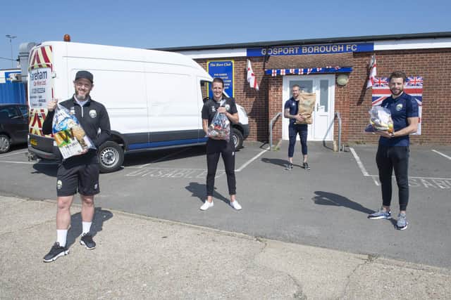 First team manager Lee Molyneaux and coach Ben Buckland, along with players Liam Robinson and Rory Williams supporting Gosport Borough's 'Feed a Family in Need' campaign, with supplies paid for by the Crowdfunding page and the van donated by Fareham Car Hire Ltd for the duration of the project. Picture: Steve Reid / Blitz Photography