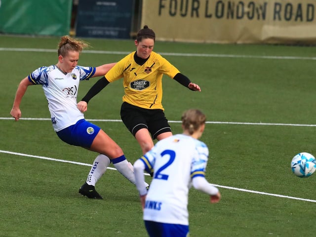 Hawks' Jodie Burchell scores one of her six goals. Picture by Dave Haines