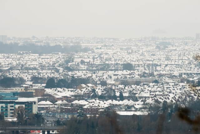 A view of a snow covered Portsmouth from Portsdown Hill. Picture: Keith Woodland