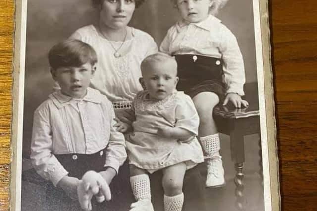 David's grandmother Beatrice Maud, Charles Williams wife, with the children and a little inscription at the bottom saying: 'From your loving wife and the boys'.