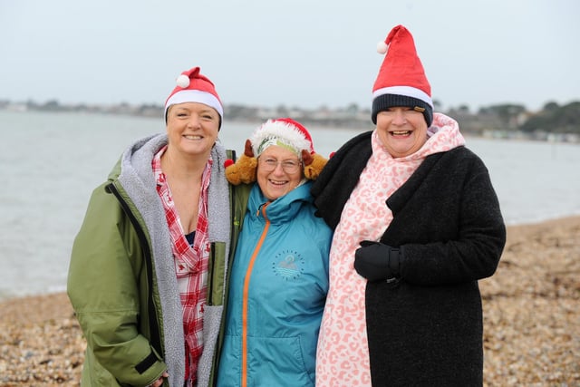 Solent Sea Swimmers held their annual Boxing Day dip in the Solent at Lee-on-the-Solent on Tuesday, December 26. 

Pictured is: (l-r) Mnady Thomson, Janet Hillier and Sam Howard all from Gosport.

Picture: Sarah Standing
