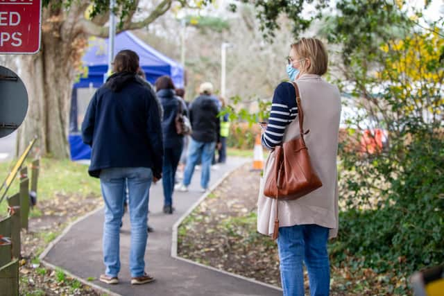 Pictured: People queuing to get their booster jab at  the Covid-19 vaccination centre at St Jame s Hospital, Portsmouth

Picture: Habibur Rahman