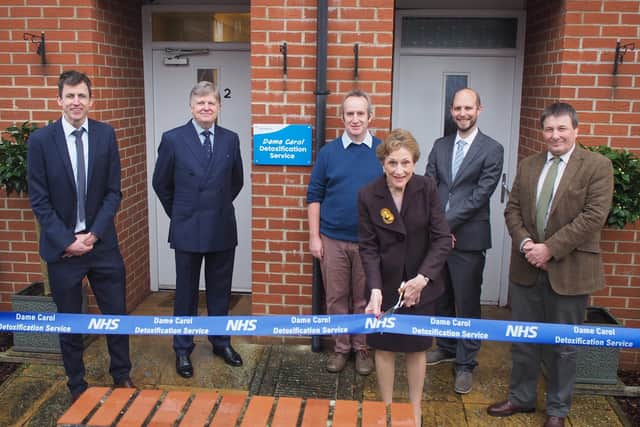From left, Simon Bryant, Cllr Bill Withers, Howard King, Danny Hames and Steve Benson at the opening of the new Dame Carol Detoxification Service in Fareham. Dame Carol Black is cutting the ribbon. Picture: Hampshire County Council