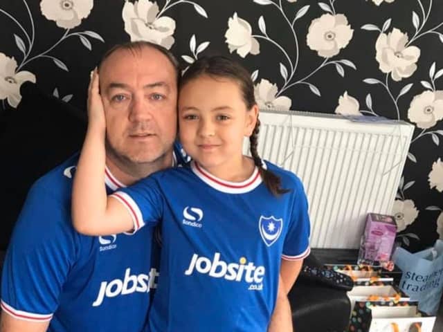 Pompey fan Dom Merrix, 48, of North End, pictured with his 10-year-old daughter Ellie-Mai. Dom died on Thursday of a suspected case of Covid-19