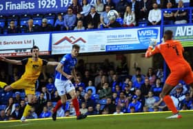 Gavin Bazunu pushes away John Marquis' first-half attempt at Fratton Park. Picture: Barry Zee
