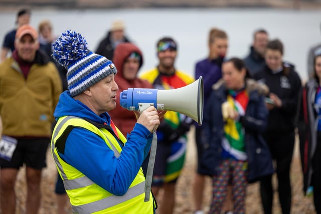 Event organiser Rob Piggott briefs the runners at the Langstone Harbour Half Marathon. Picture: Mike Cooter (170224)