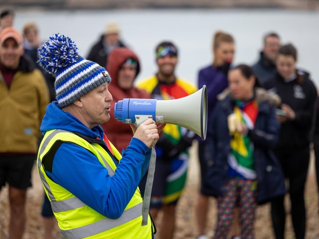 Event organiser Rob Piggott briefs the runners at the Langstone Harbour Half Marathon. Picture: Mike Cooter (170224)