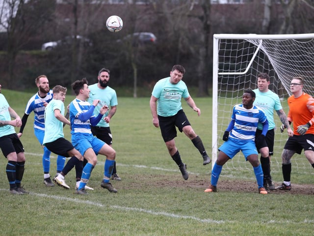 AC Copnor (blue/white hoops) v Old Boys Athletic. Picture: Stuart Martin