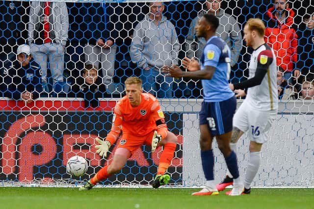 Alex Bass saved Joe Jacobson's first half penalty at Wycombe