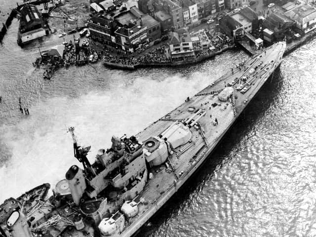 HMS Vanguard aground in Portsmouth Harbour 60 years ago today, August 4, 1960. Picture: Roy West PP5336