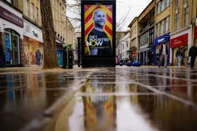 A Coronavirus booster poster. Picture: Ben Birchall/PA Wire