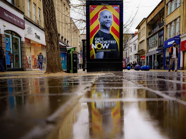 A Coronavirus booster poster. Picture: Ben Birchall/PA Wire