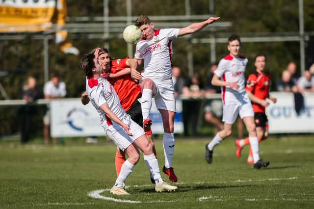 Horndean (white shirts) could have to play their final six Wessex League matches in 10 days after last night's fixture with Bemerton was rained off. Picture by Nathan Lipsham