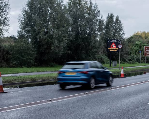 Eastern Road has two lanes closed while Southern Water complete repairs following a burst sewer. 
Pictured: Flooding in Eastern Road, Portsmouth.
Picture: Habibur Rahman