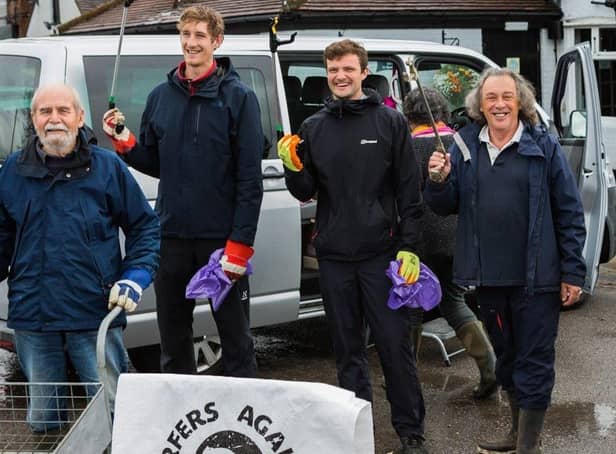 Volunteers take part in the beach clean. Picture: Mike Owens