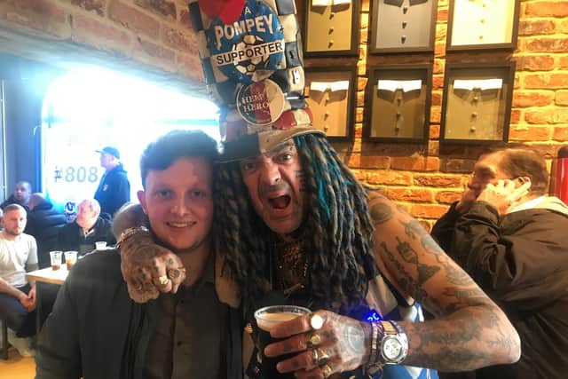 John Westwood poses with a young fan ahead of Pompey's FA Cup encounter at Maidenhead in November 2018