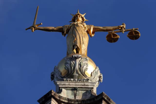 FW Pomeroy's Statue of Lady Justice atop the Central Criminal Court building at the Old Bailey, London Picture: Jonathan Brady / PA