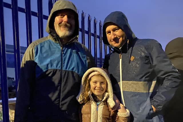 Pompey fans depart from Fratton Park for the Tottenham Hotspur Stadium. Pictured is Phil Sandys, his daughter Orla, and Andy Strahan, from Hilsea.