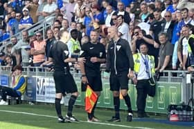 Julian Browning takes over as assistant referee against Cheltenham after an injury to TWO officials. Pic: Marcus Browning