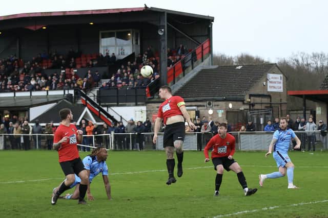 Fareham (red) v Portchester in front of a bumper crowd of 621 in January this year. Another large attendance is expected on Tuesday for the Wessex League Cup semi-final between the 'El Creekio' rivals. Picture: Martin Denyer.