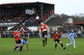 Fareham (red) v Portchester in front of a bumper crowd of 621 in January this year. Another large attendance is expected on Tuesday for the Wessex League Cup semi-final between the 'El Creekio' rivals. Picture: Martin Denyer.