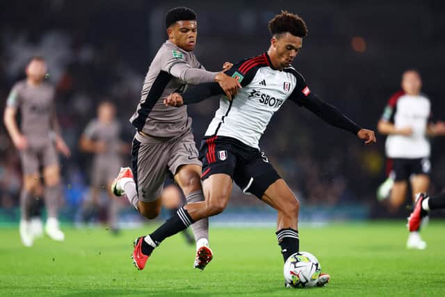 Dane Scarlett challenges Fulham's Antonee Robinson in Tuesday night Carabao Cup action. Picture: Clive Rose/Getty Images