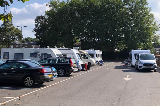 More than six vehicles have encamped in the car park behind Portchester shopping precinct.