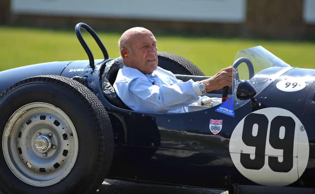 Sir Stirling Moss driving an historic Grand Prix car after taking part in the Goodwood Festival of Speed in 2011. Picture: PA Wire