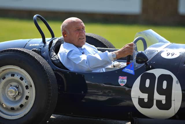 Sir Stirling Moss driving an historic Grand Prix car after taking part in the Goodwood Festival of Speed in 2011. Picture: PA Wire