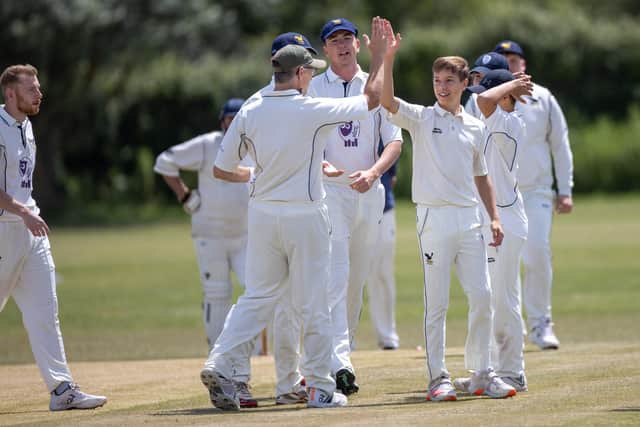 Purbrook bowler Daniel Porton celebrates taking a Portsmouth wicket.
Photo by Alex Shute