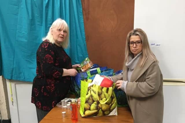 Jacobs Well in Gosport had to temporarily close due coronavirus. Pictured: Anne Hamilton, receptionist, and Lorraine Pottinger